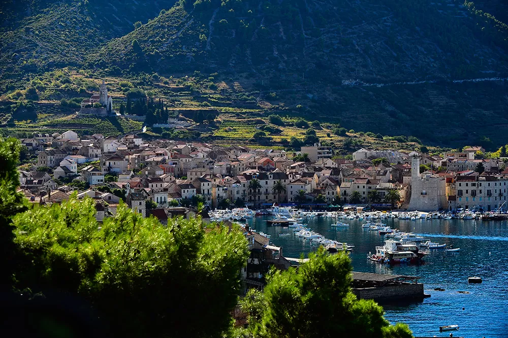 Panorama of the town of Komiža below the hill Hum which separates it from the rest of the island of Vis
